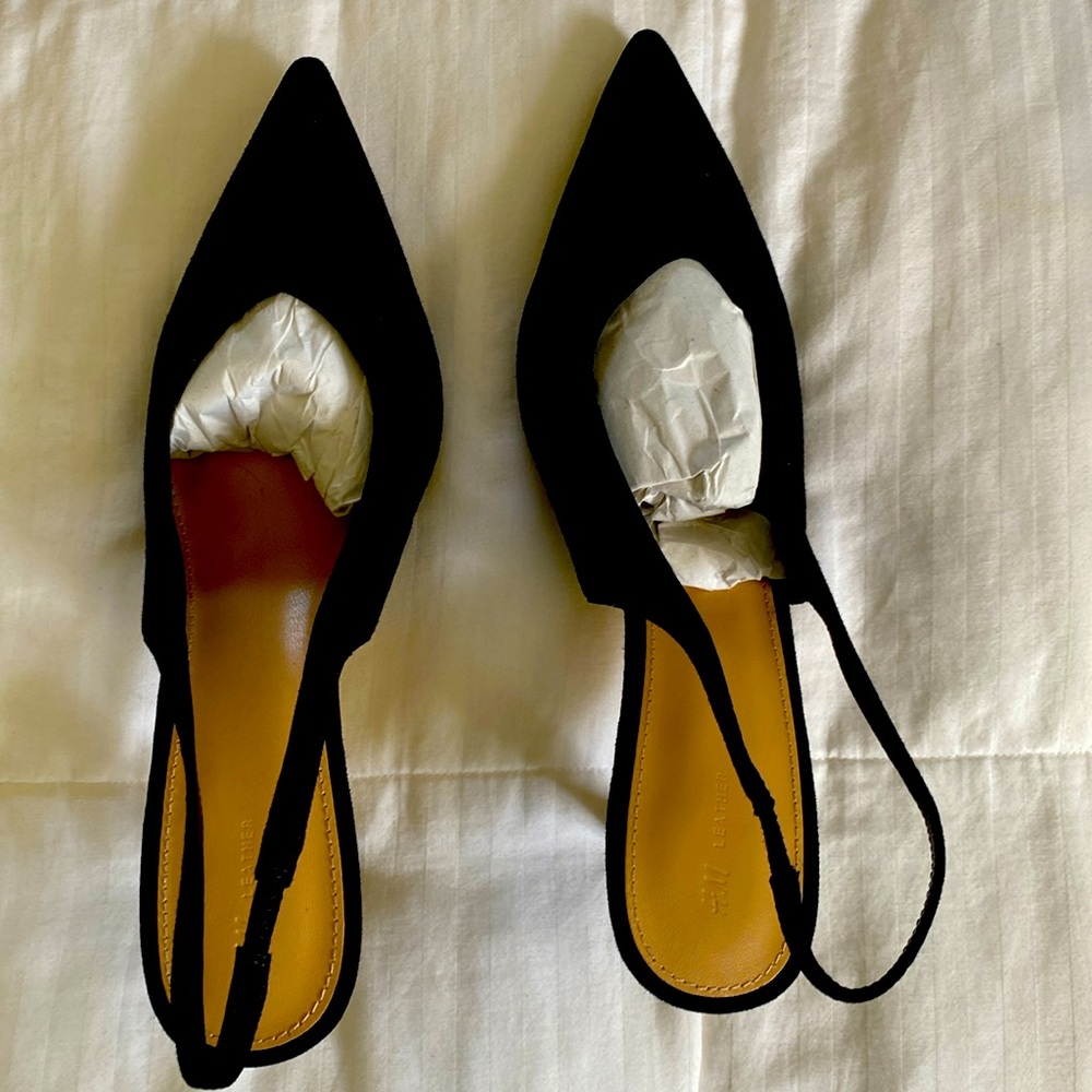 Never been worn. H&M black suede sling-back heels. Very Sexy!